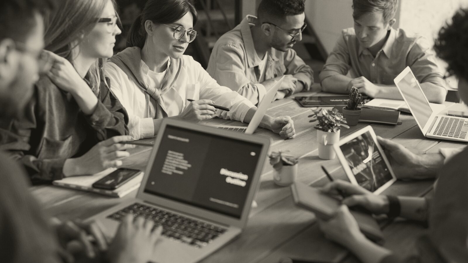 A lending team reviewing valuation figures
